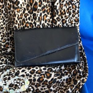 Rolf’s vintage leather clutch